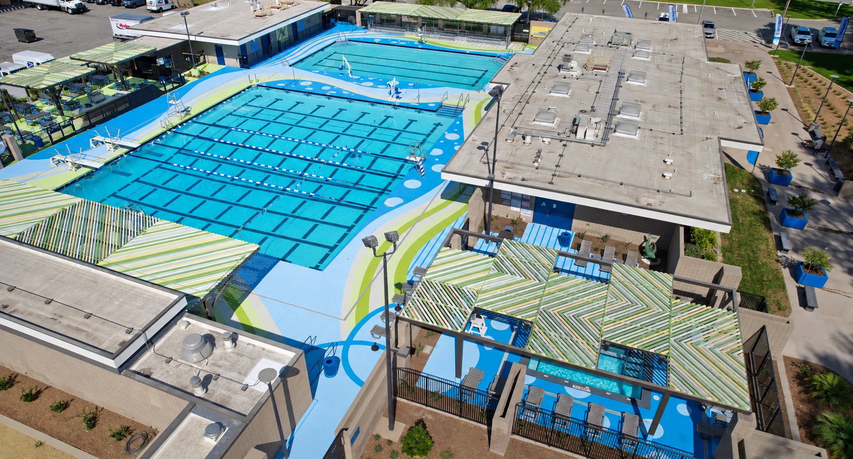 Bird's-eye view of the Paul T. Nakamura Regional Aquatic Center pool deck in Santa Fe Springs, California