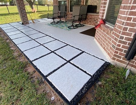pavers with stones between