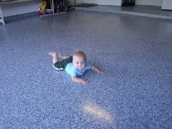 Garage Chip Floo With -Baby
Concrete Floors
Sundek
