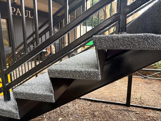 Restored stairs at Tysons Galleria with slip-resistant coating