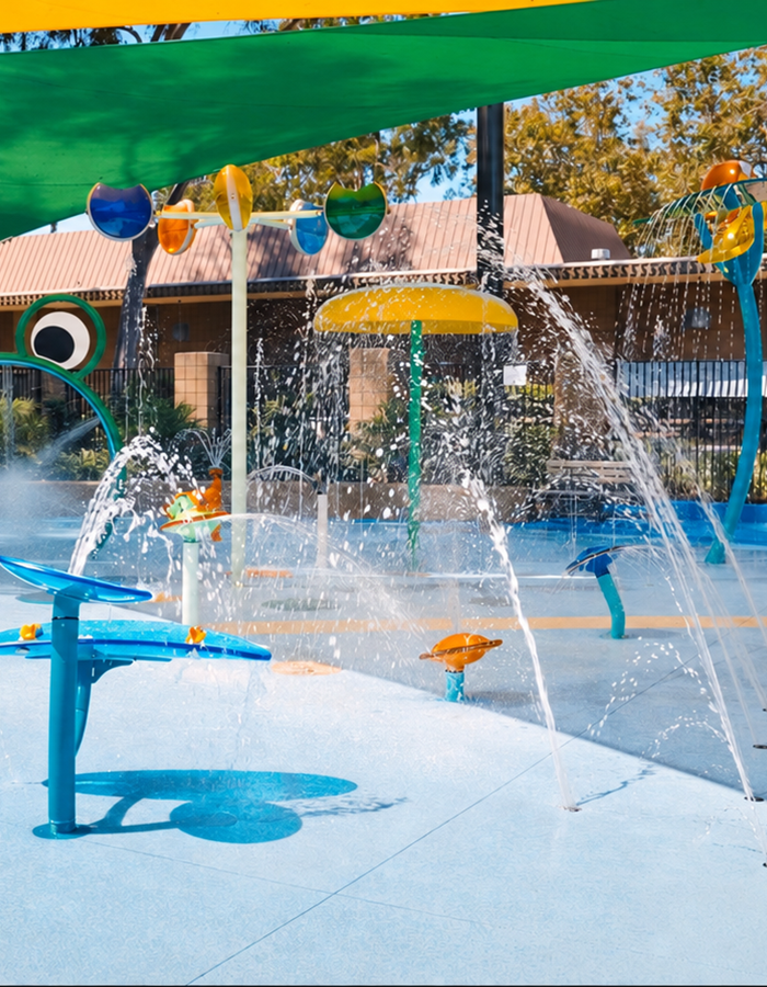 Classic Texture around high-traffic splash pad in Santa Fe Springs