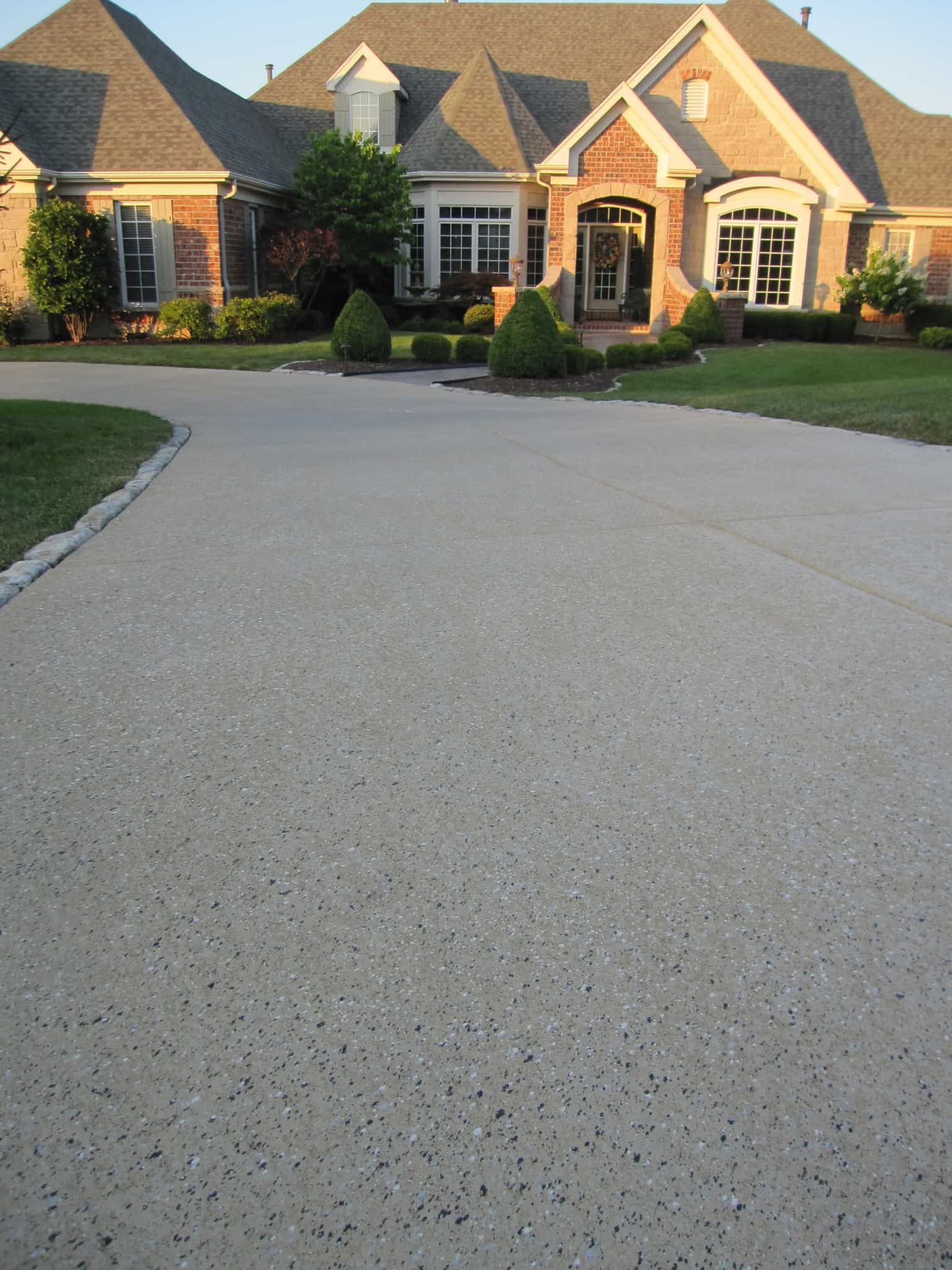 Can Decorative Concrete Resurfacing Salvage a Damaged Driveway? | SUNDEK